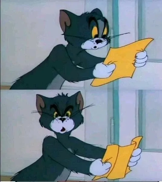 Câu hỏi khó hiểu đi kèm meme mèo tom chấm hỏi